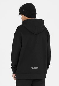 Les'Arcs Kapuzenpullover - zwart