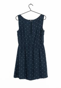 Námořnické modré bezrukávové šaty s bílým potiskem kotvy, elastickým pasem a kulatým výstřihem. Vyrobeno z lehké, hladké tkaniny.