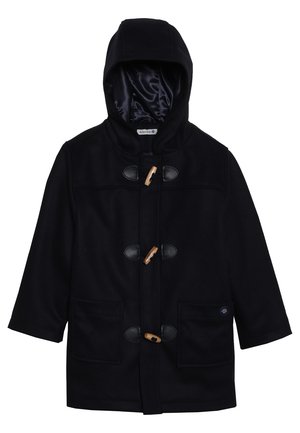 Marineblå uld duffelcoat med hætte, lukning med toggles, to frontlommer og satinforing. Har rundede læderdetaljer.