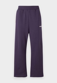 Purple cotton joggers with an elastic waistband, featuring a straight-leg design and a small white logo on the front.