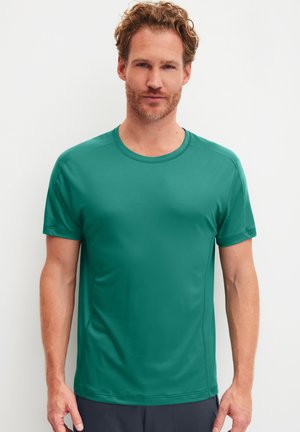 Grünes Sport-T-Shirt aus glattem, feuchtigkeitsableitendem Stoff. Verfügt über einen runden Halsausschnitt und kurze Ärmel, mit schmaler Passform und nahtlosem Design.