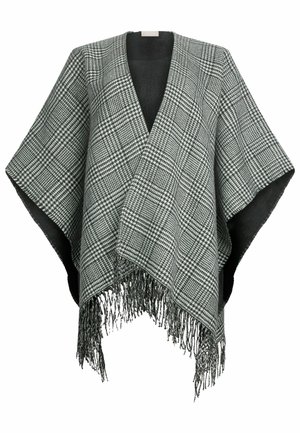 Poncho a varie righe in bianco e nero con orlo sfrangiato, realizzato in un materiale morbido. Design aperto, con scollatura a V e maniche ampie.