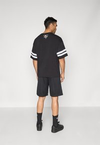 Champion ICONS CLASSIC SHORTS - Kurze Sporthose - black
