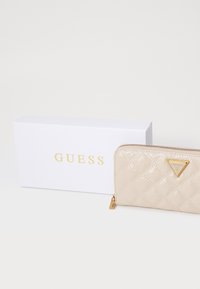 Guess GIULLY LARGE ZIP AROUND - Plånbok - almond