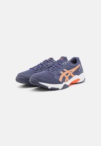 Navy athletic shoes with mesh and synthetic material, featuring bright orange accents, white midsole, and textured rubber outsole.
