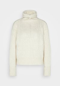 Bílý žebrovaný svetr s vysokým límcem a zapínáním na zip, s texturovanými vzory a přiléhavými lemy. Vyrobený z měkké, teplé látky.