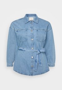 Light blue denim shirt jacket with long sleeves, two front pockets, and a tied belt at waist. Features a classic collar and button closure.