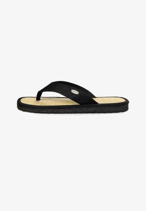 Black flip-flop with textured fabric straps and a woven straw-like footbed; features a black rubber sole with a subtle logo accent.