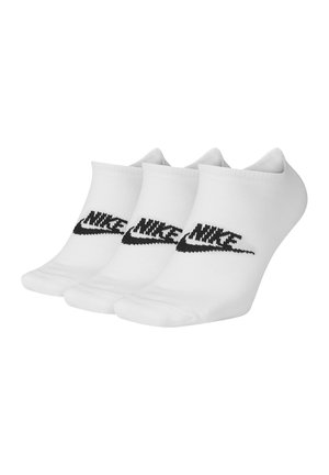 Calcetines tobilleros blancos con logo negro de Nike, hechos de una tela suave, con un puño acanalado para mayor soporte y una textura lisa. Paquete de tres pares.