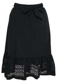 Svart kjol med en åtsittande midja med en rosett, en volang nederkant och ett dekorativt utskuret spetsmönster längs botten.