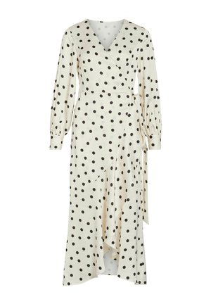 Robe portefeuille crème à pois noirs, manches longues bouffantes, encolure en V, ceinture à la taille et ourlet asymétrique à volants.