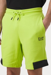 EA7 Emporio Armani Tracksuit bottoms - verde acido