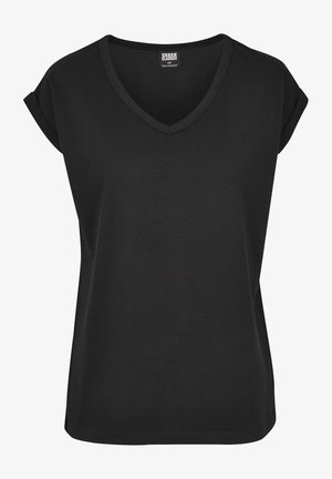 Fekete V nyakú póló felgöngyölt ujjakkal, puha pamut anyagból készült; laza fazon, tiszta varrásokkal és látható minták vagy díszítések nélkül.