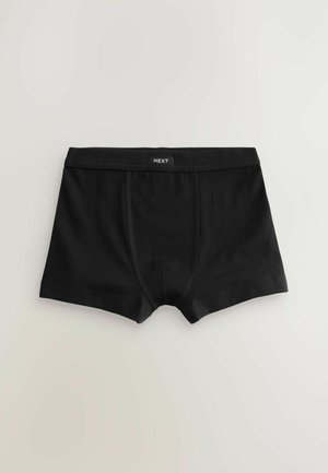 Czarne bokserki wykonane z elastycznego materiału o gładkiej fakturze, z logo na pasku i klasycznym kroju. Przednie szwy dla lepszej struktury.