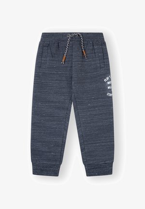 Pantalones de chándal azul marino hechos de tejido texturizado, con cintura elástica y cordón, bolsillos laterales y detalle de texto impreso.