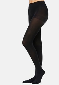 Medias opacas negras con textura suave, diseño sin costuras y cintura alta. Cuentan con suelas reforzadas y acabado mate.