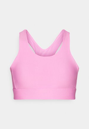 Ροζ αθλητικό σουτιέν με απαλό ύφασμα, σχεδιασμό racerback και φαρδιές τιράντες. Διαθέτει ραμμή χωρίς ραφές και έχει σχεδιαστεί για άνεση και στήριξη.