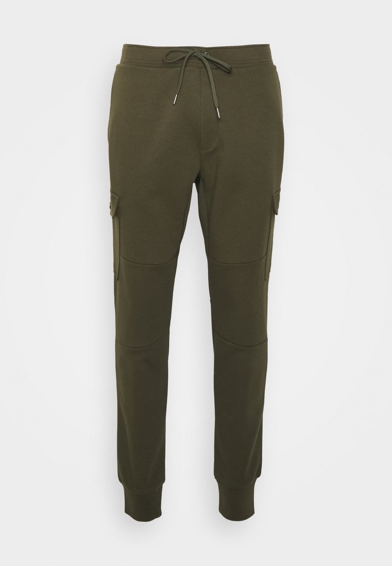Olivgröna sweatpants med justerbar dragsko, tapered byxben och sidofickor. Tillverkade av ett mjukt, strukturerat tyg.