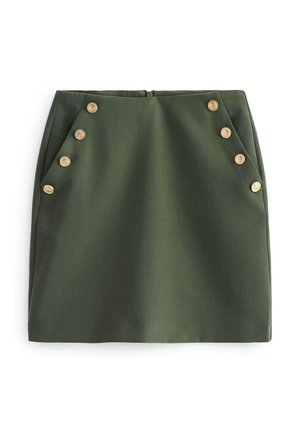 Olijfgroene minirok met hoge taille, gouden decoratieve knopen gerangschikt in twee verticale rijen aan de voorzijden.