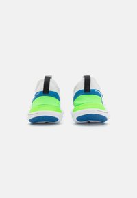 Sneakers with a gray upper, green textured midsection, and blue accents. Features a white sole and black pull tab for easy wear.