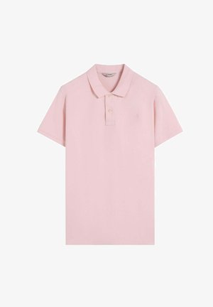 Vaaleanpunainen puuvillapolo-paita, jossa on kaulus, lyhyet hihat ja kaksinappinen napitus. Rintaan brodeerattu hienovarainen logo.