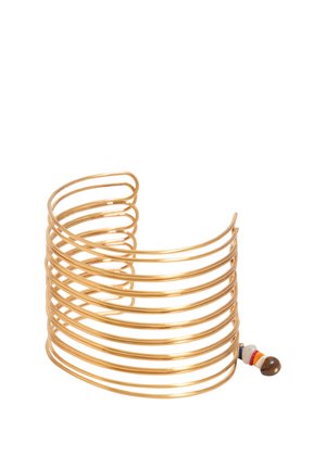 Gold-tone multi-band cuff bracelet with small multicolored beads on one end on a white background.