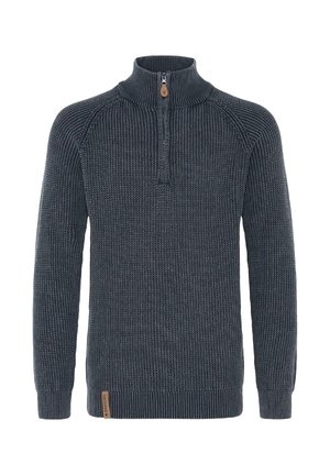 Mørkegrå striktrøje med ribbet halv-zippet krave, lange ærmer og et lille brunt mærke nær bunden af kanten.