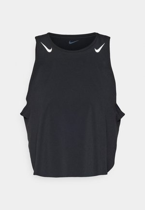 Camiseta sin mangas negra de deporte con escote redondeado, aberturas laterales y logotipos blancos de Nike en los hombros. Tejido suave y ligero.