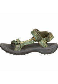 Teva-sandaler med texturerade gröna och flerfärgade vävda remmar, dämpande fotbädd och en grå gummisula med mönstrad slitbana.