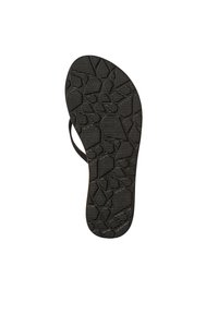 Sole in gomma nera con un motivo geometrico testurizzato. Presenta sottili cinturini e un materiale in gomma resistente e antiscivolo.