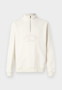 Felpa bianca con collo a mezzo zip, testo ricamato "ORIGINALS", polsini a coste e una vestibilità comoda. Tessuto morbido.