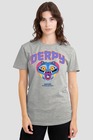 Young woman wearing a gray T-shirt with a colorful, cartoonish blue cat face and text "DERPY" and "KPOP DEMON HUNTERS."
