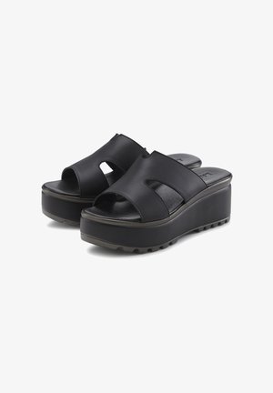 Black platform sandals made of smooth leather, featuring two cut-out sections on the upper and a textured rubber sole.