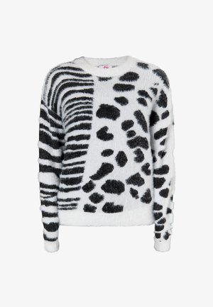 Maglione fuzzy bianco e nero con una combinazione di motivi a righe e a pois, scollo a girocollo e maniche lunghe con dettaglio texturizzato.