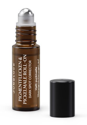 Kleine bernsteinfarbene Glas-Roll-on-Flasche mit der Aufschrift "Dark Spot Corrector" und schwarzem Deckel, der neben ihr auf weißem Hintergrund liegt.