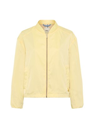 Hellgelbe Bomberjacke mit Frontreißverschluss, elastischen Bündchen, zwei Seitentaschen und einem kleinen Markenschild am Saum.