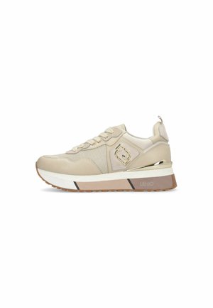Beige sneakers with a textured mesh and smooth leather upper, featuring a gold accent and a cushioned sole with a light brown tread.