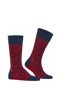 Chaussettes à motifs rouges et bleu marine avec un design en losanges et des bords et orteils bleu marine unis, fabriquées à partir d'un mélange textile.