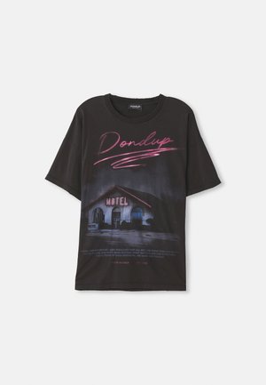 Black t-shirt featuring a graphic of a motel with pink and white text. Short sleeves and relaxed fit, made from cotton. Text includes brand name.