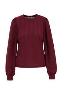 Bordo bluza s dugim, napuhanih rukava. Izrađena od teksturiranog tkanja sa cik-cak uzorkom. Okrugli izrez i pristajanje na manžetama.