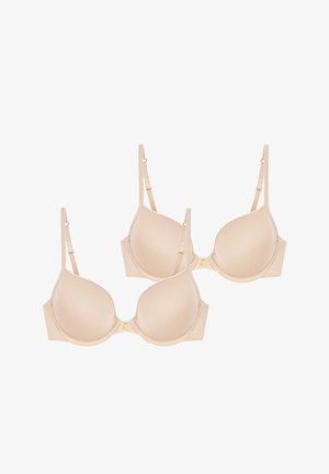 Due reggiseni imbottiti beige con spalline regolabili, caratterizzati da una texture liscia e un piccolo accento dorato al centro davanti.