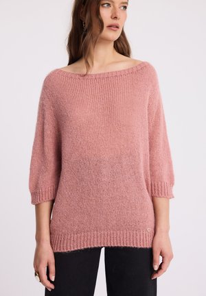- Sweter