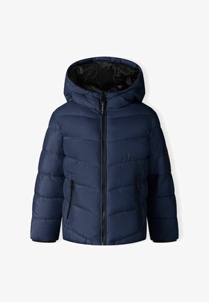 Laivastonsininen puffatakki hupulla, vetoketjulla, kahdella sivutaskulla ja vaakasuoralla tikatulla kuvioinnilla. Sisäpinta on musta ja sileä.