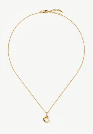 Õrn kuldne kettkaelakee väikese kuldse tähega "C" ripatsiga ja lameda kinnitusega valgel taustal.