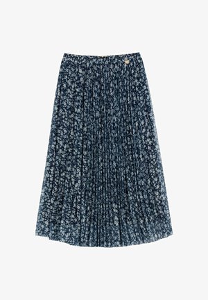 Granatowa plisowana spódnica z drobnym białym wzorem kwiatowym, elastycznym pasem i małą okrągłą złotą zawieszką blisko górnej krawędzi.