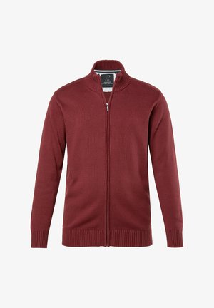 Cardigan zip-up bordeaux con texture a coste, colletto alto e maniche lunghe. Presenta una chiusura con zip e un logo discreto sull'etichetta.