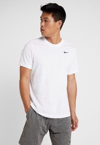 Nike Performance - TEE CREW SOLID - Sports T-shirts - white/black Miniaturebillede 1