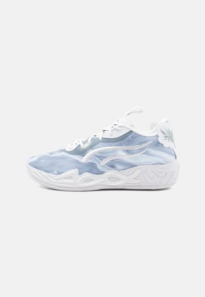 Mesh athletic shoe in light blue, featuring a textured upper, white laces, and a patterned white sole with cut-out details.