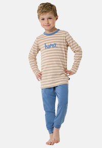 Striped long-sleeve top in beige and white with blue accents, featuring the word "happy" in blue. Paired with light blue pants.