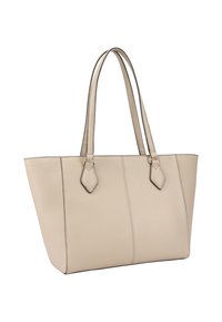Sac fourre-tout en cuir beige avec deux longues poignées, présentant des coutures verticales et des accents triangulaires sur les attaches des poignées.